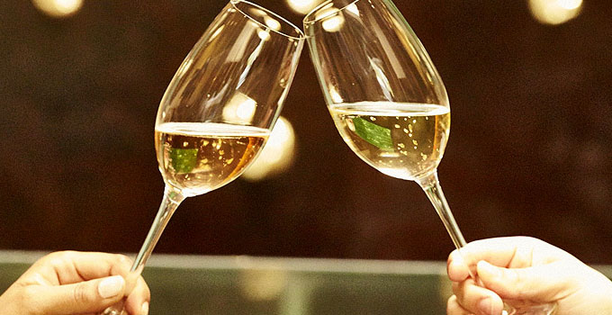 cheers with glass of champagne