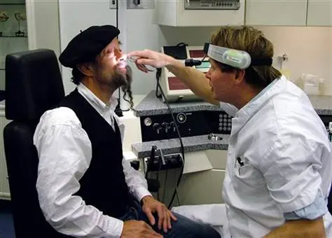 A Doctor examining the nose of wine taster Ilja Gort